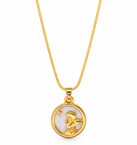 Gold necklace with a round pendant on a white background