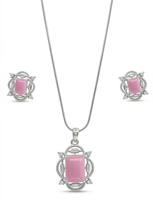 Jewelry set with pink gemstone pendant and earrings on a white background