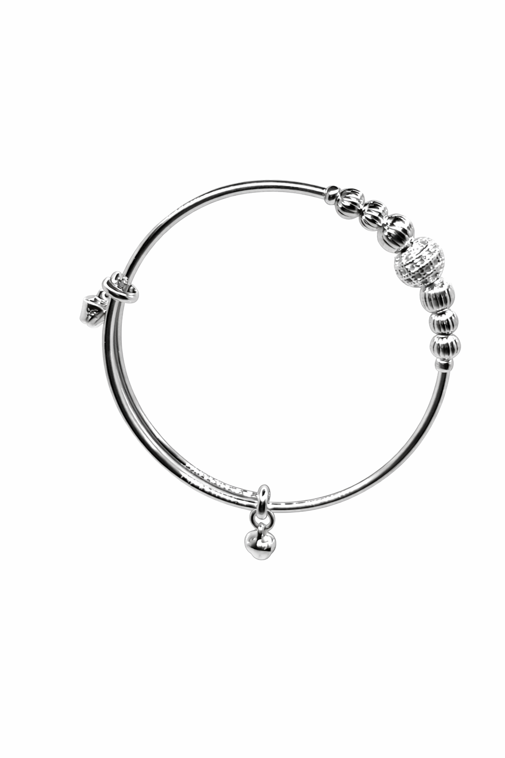 Silver bracelet with small charms on a white background