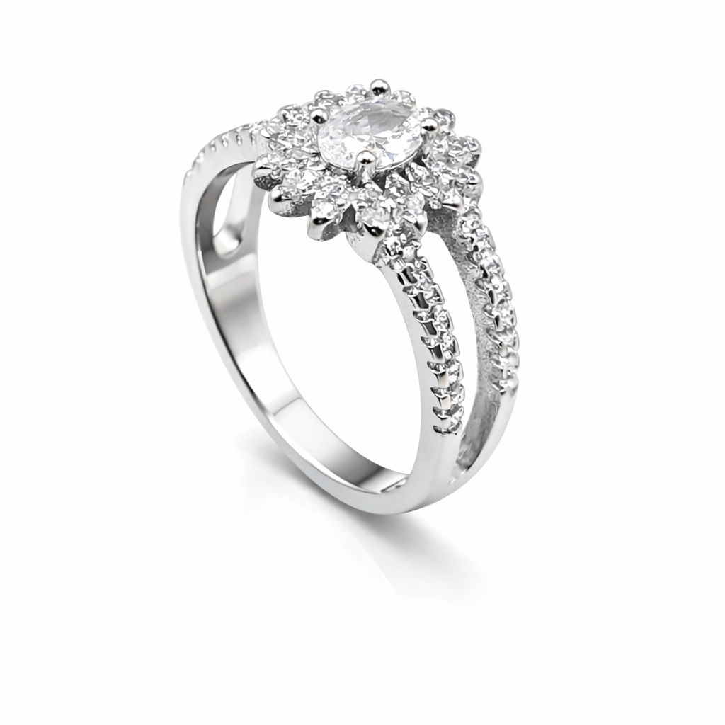 Silver ring with a diamond cluster on a white background