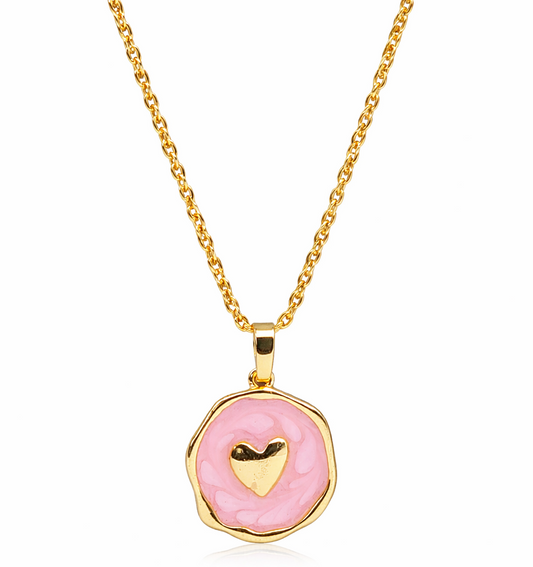 Necklace with a pink pendant featuring a gold heart on a white background