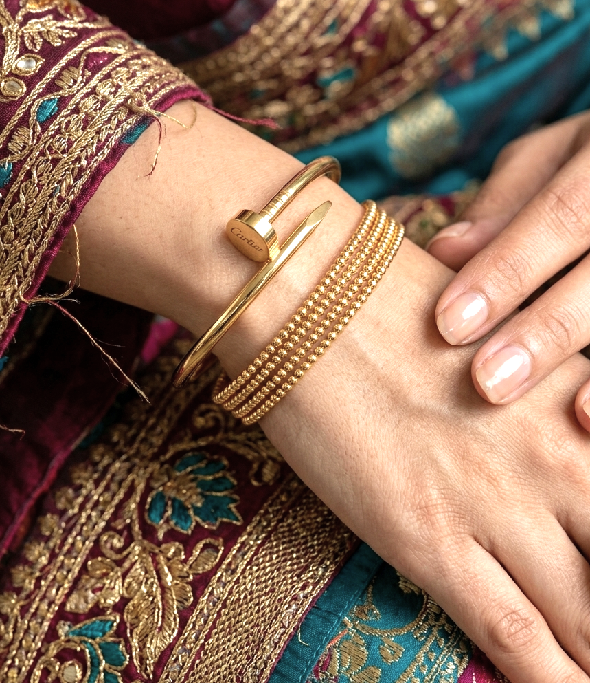 gold polished luxe nail love bracelet for women gold polished luxe nail love bracelet for women